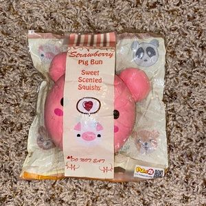 Puni-maru pink pig face squishy.